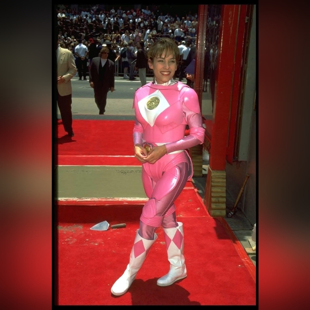Eye-Catching Pink Jumpsuit with Long Sleeves and Bold Graphic Design